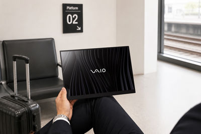 man holding a VAIO Vision+ 14P monitor